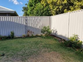 Newly installed Colorbond fence in a huge backyard in residential property in Melville WA.