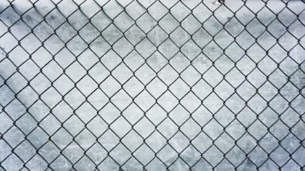 Durable chain link fence installed in a vacant lot for protection and security in the area in Melville WA.